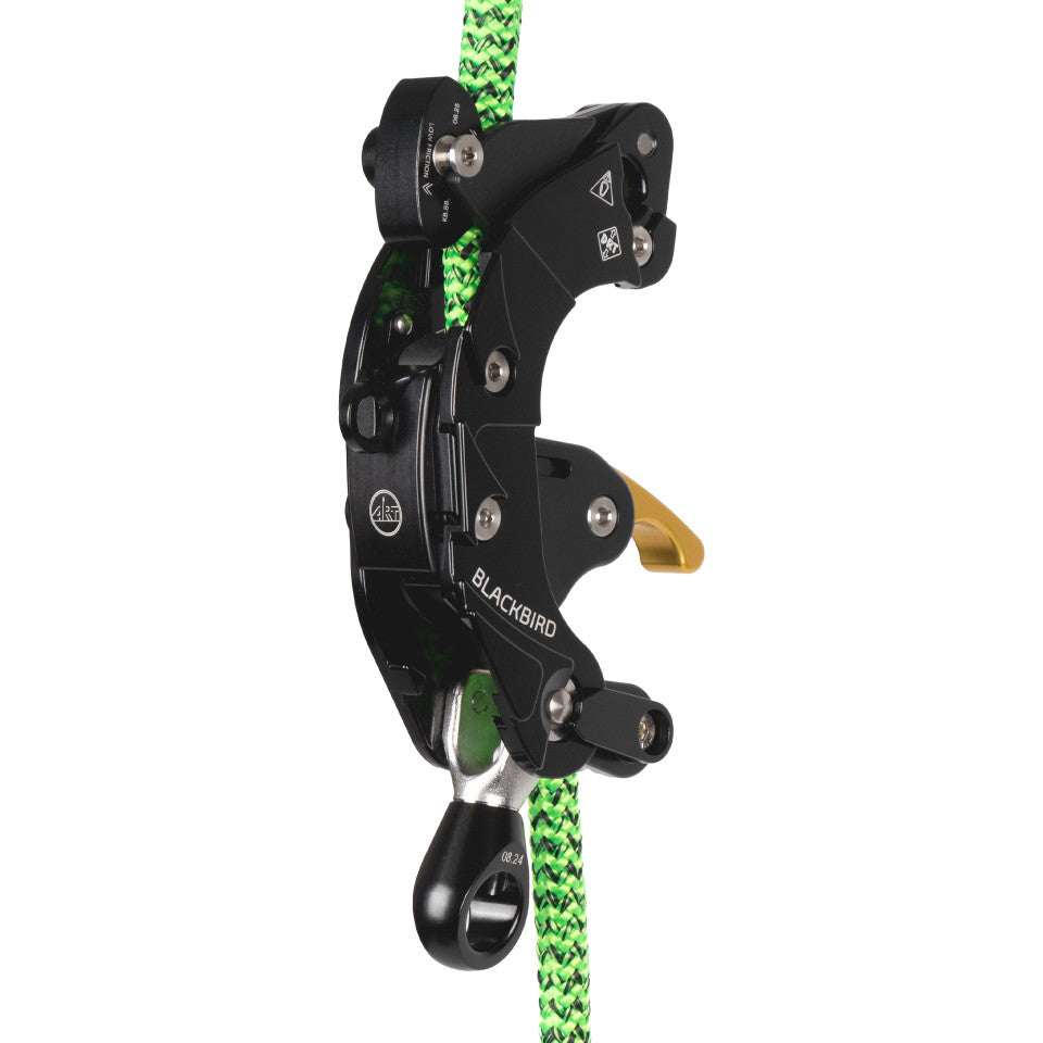 Black archery bow sight with green string on a white background
