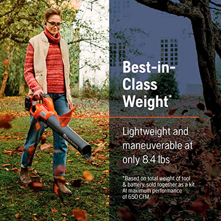 Person using a Husqvarna leaf blower in a park with text about tool weight