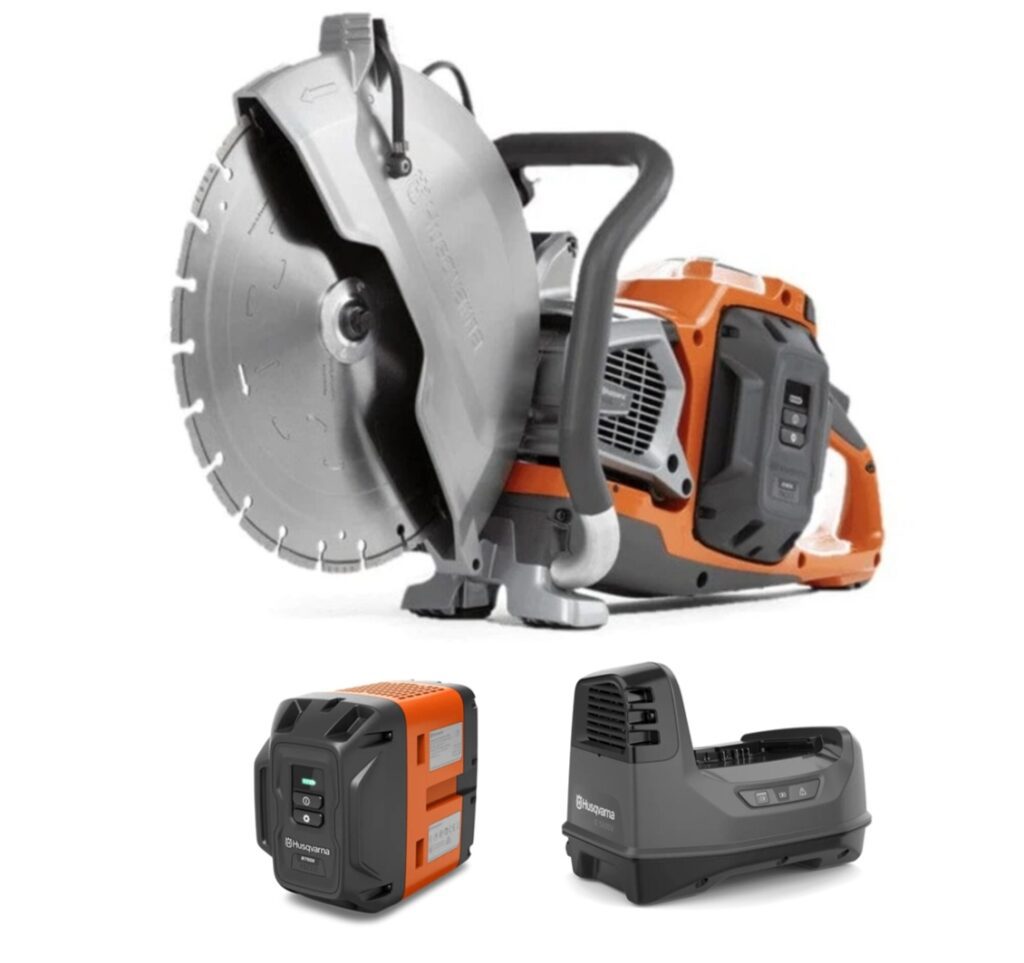 A cordless Husqvarna K1 PACE Power Cutter Kit with a large silver blade, orange and gray body, shown above two matching battery and charger accessories on a plain white background.