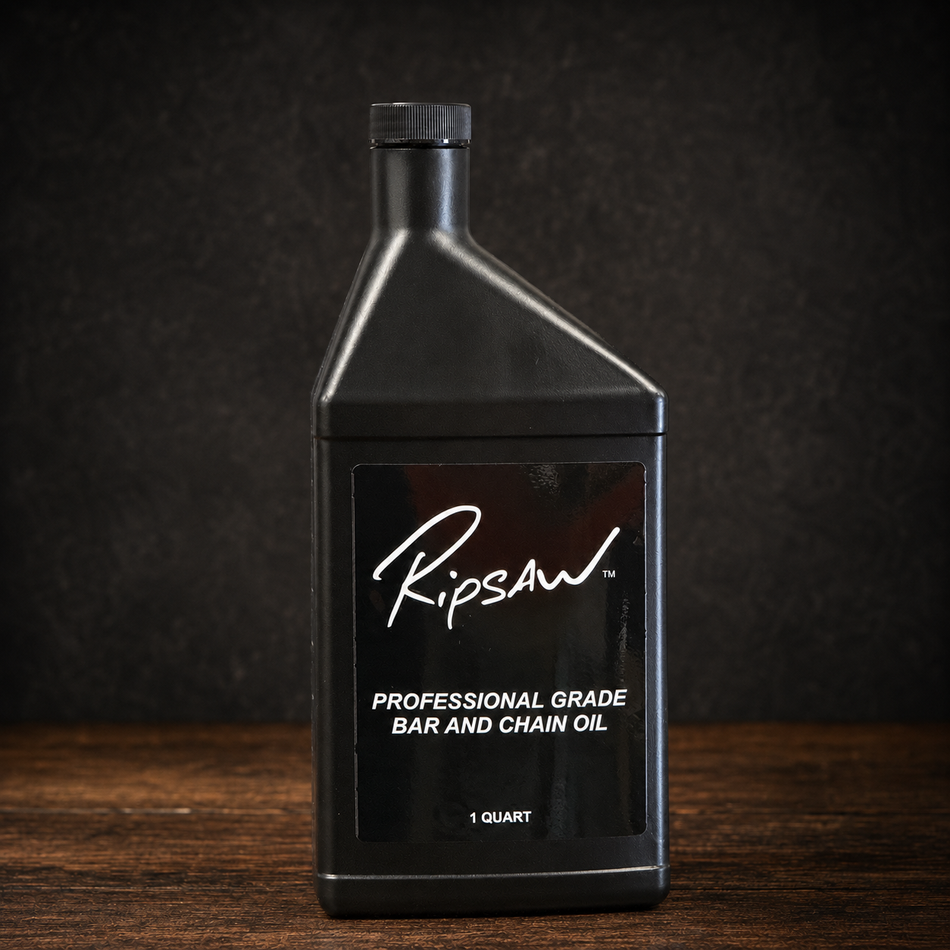 A 1 quart black plastic bottle of Ripsaw Professional Grade Bar and Chain Oil, standing on a dark wooden surface against a dark textured background.