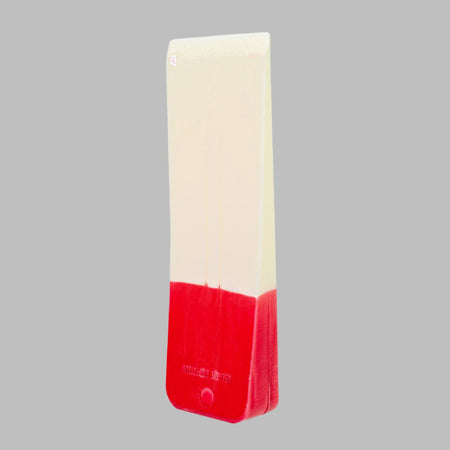 A 10 inch red headed felling wedge on a gray background. 