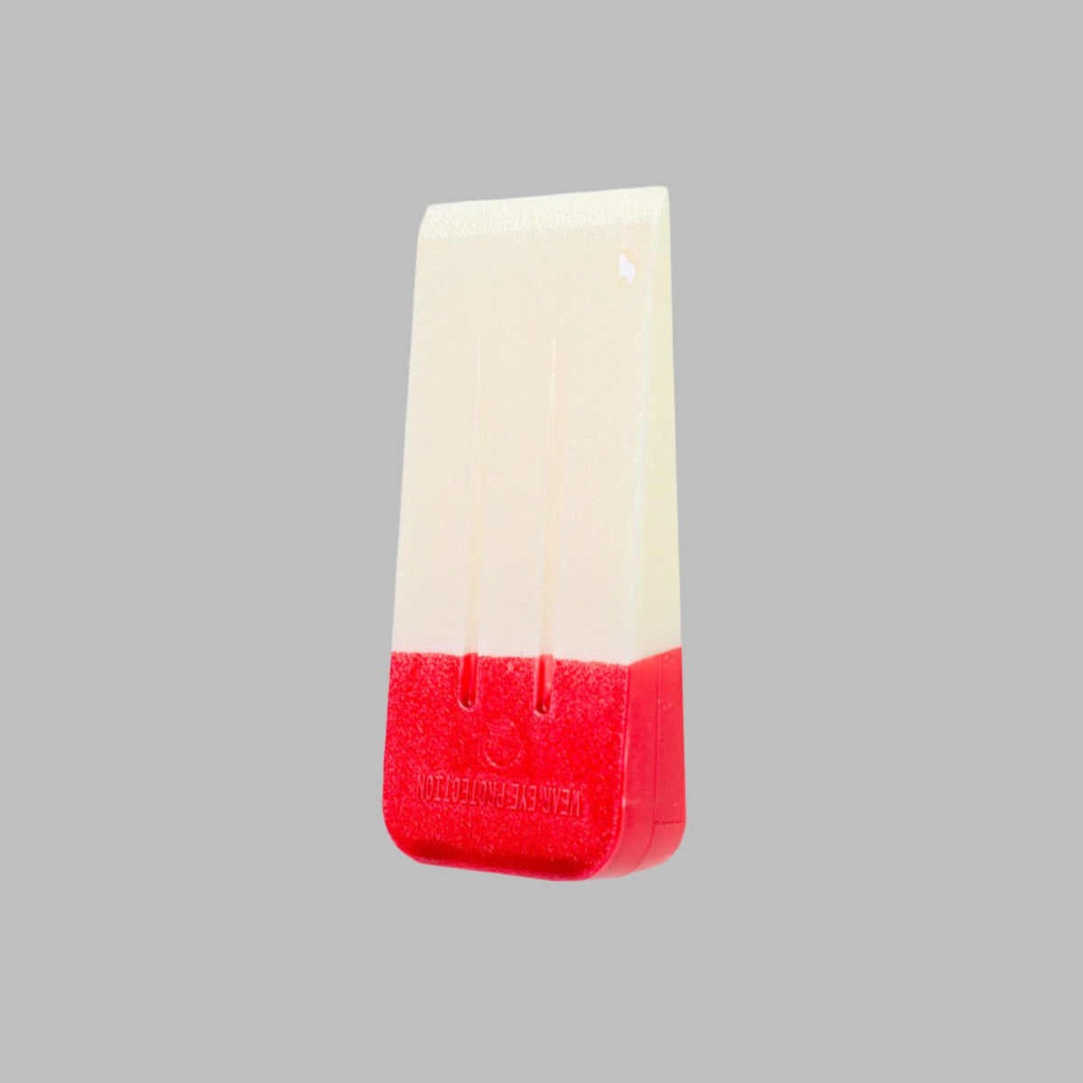 A 5.5 inch red headed felling wedge on a gray background.