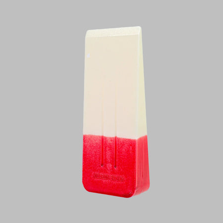 An 8 inch red headed felling wedge on a gray background.