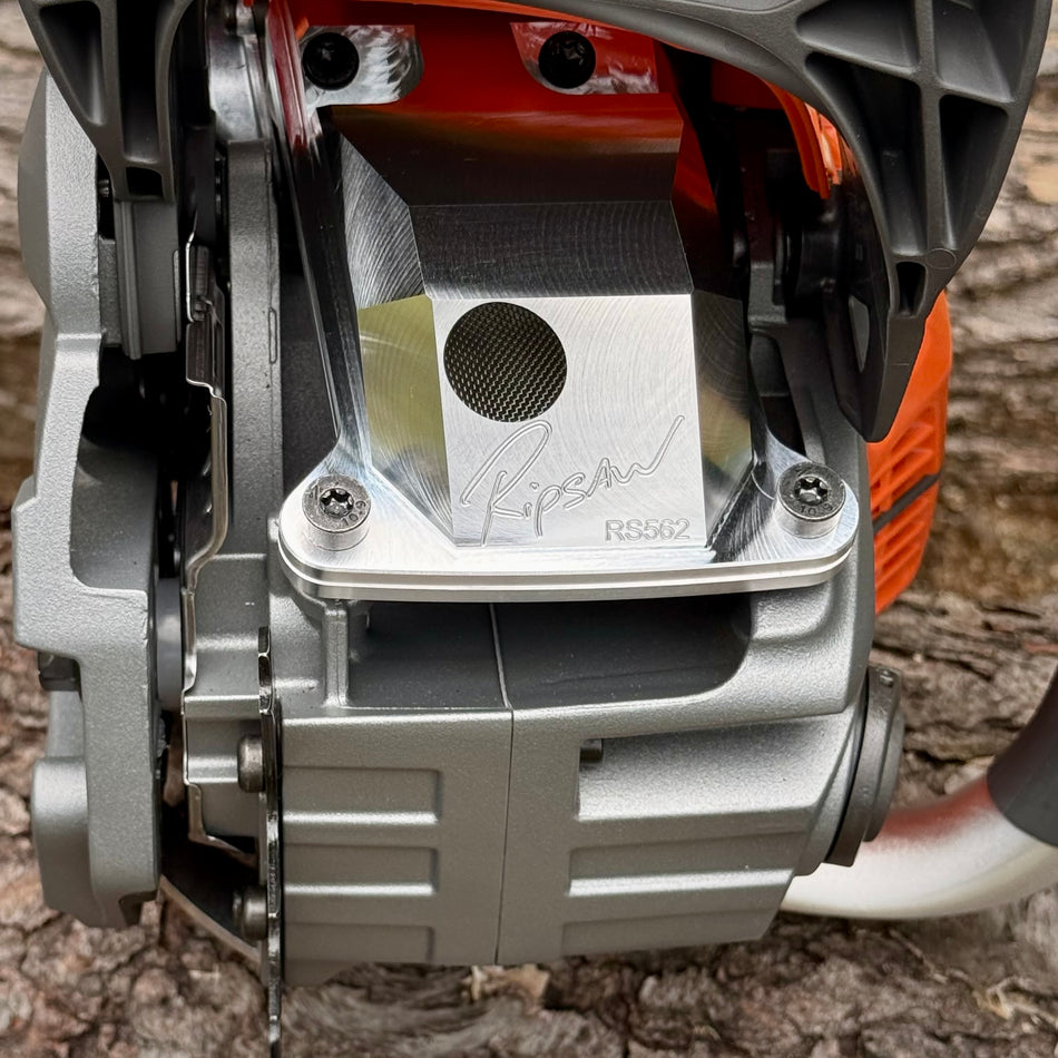 A Husqvarna 562 with a Ripsaw Signature Series Chainsaw Exhaust