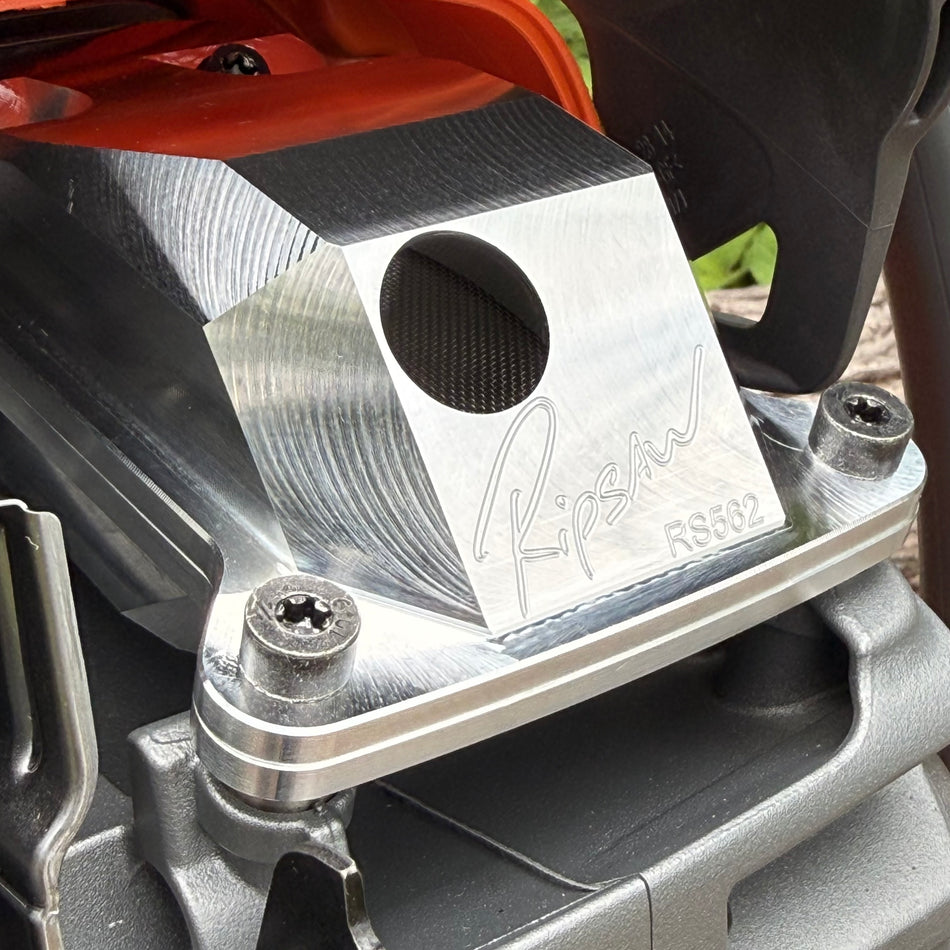 A Husqvarna 562 with a Ripsaw Signature Series Chainsaw Exhaust