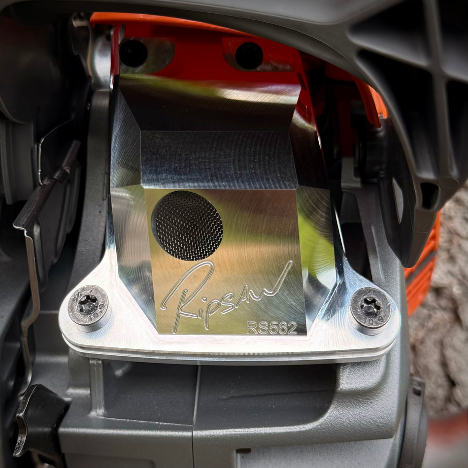 A Husqvarna 562 with a Ripsaw Signature Series Chainsaw Exhaust
