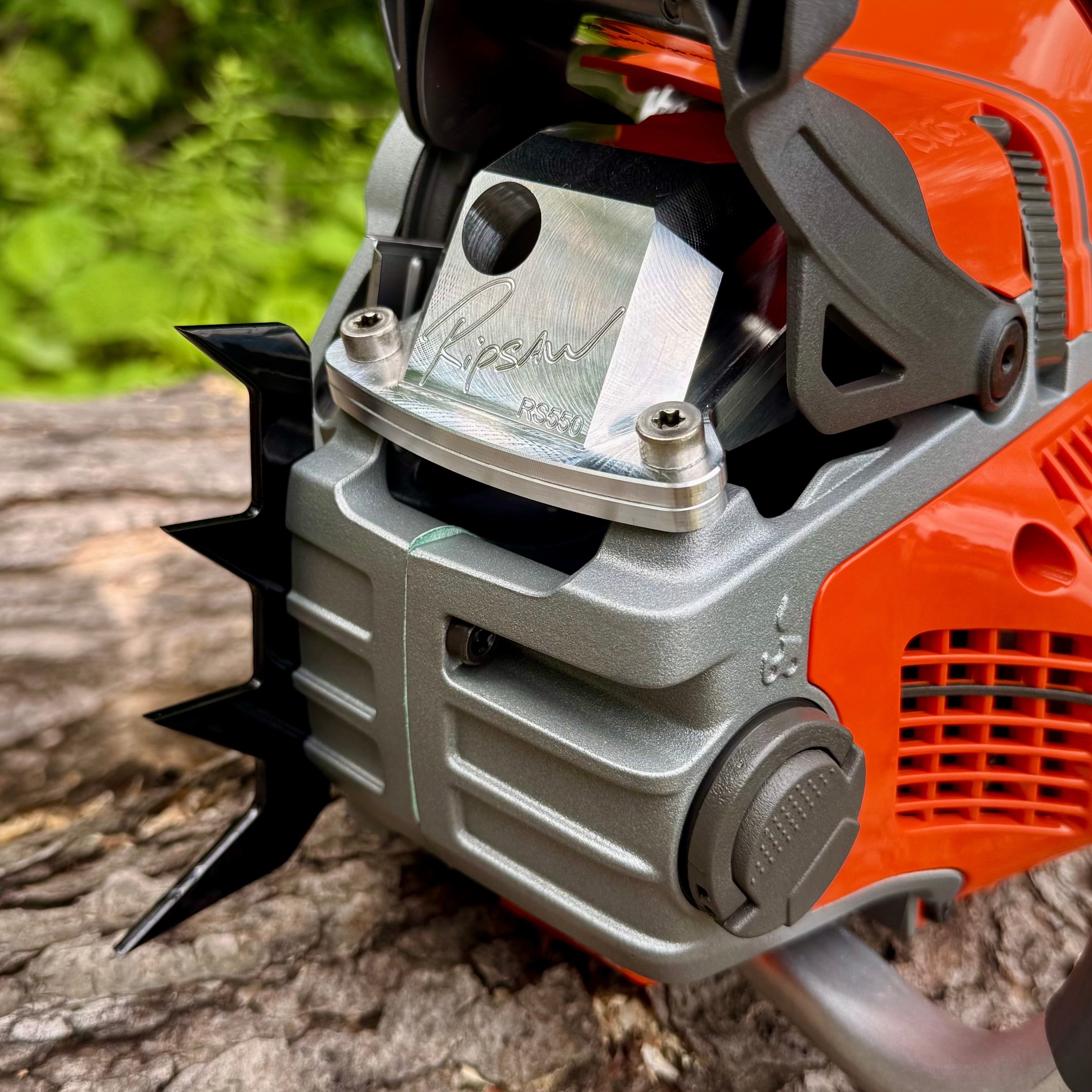 A Ripsaw 4 point felling dog installed on a Husqvarna 550xpg.